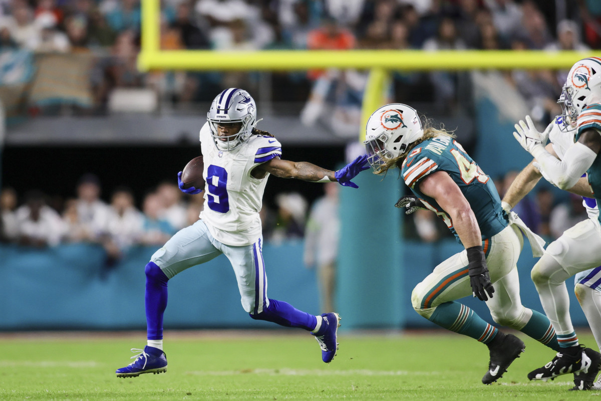 Dec 24, 2023; Miami Gardens, Florida, USA; Dallas Cowboys wide receiver KaVontae Turpin (9) runs with the football against Miami Dolphins linebacker Andrew Van Ginkel (43) during the fourth quarter at Hard Rock Stadium.
